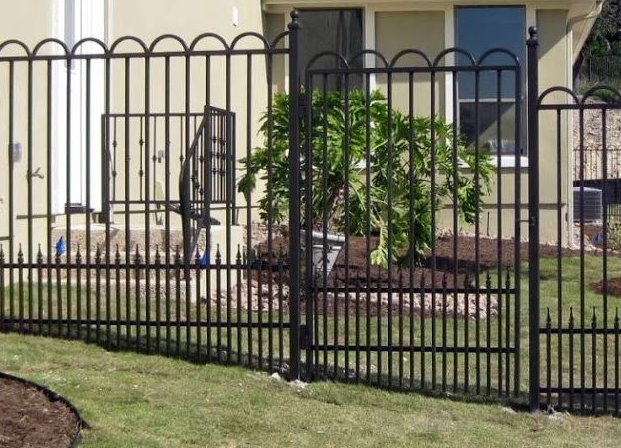 Ornamental fence with puppy pickets